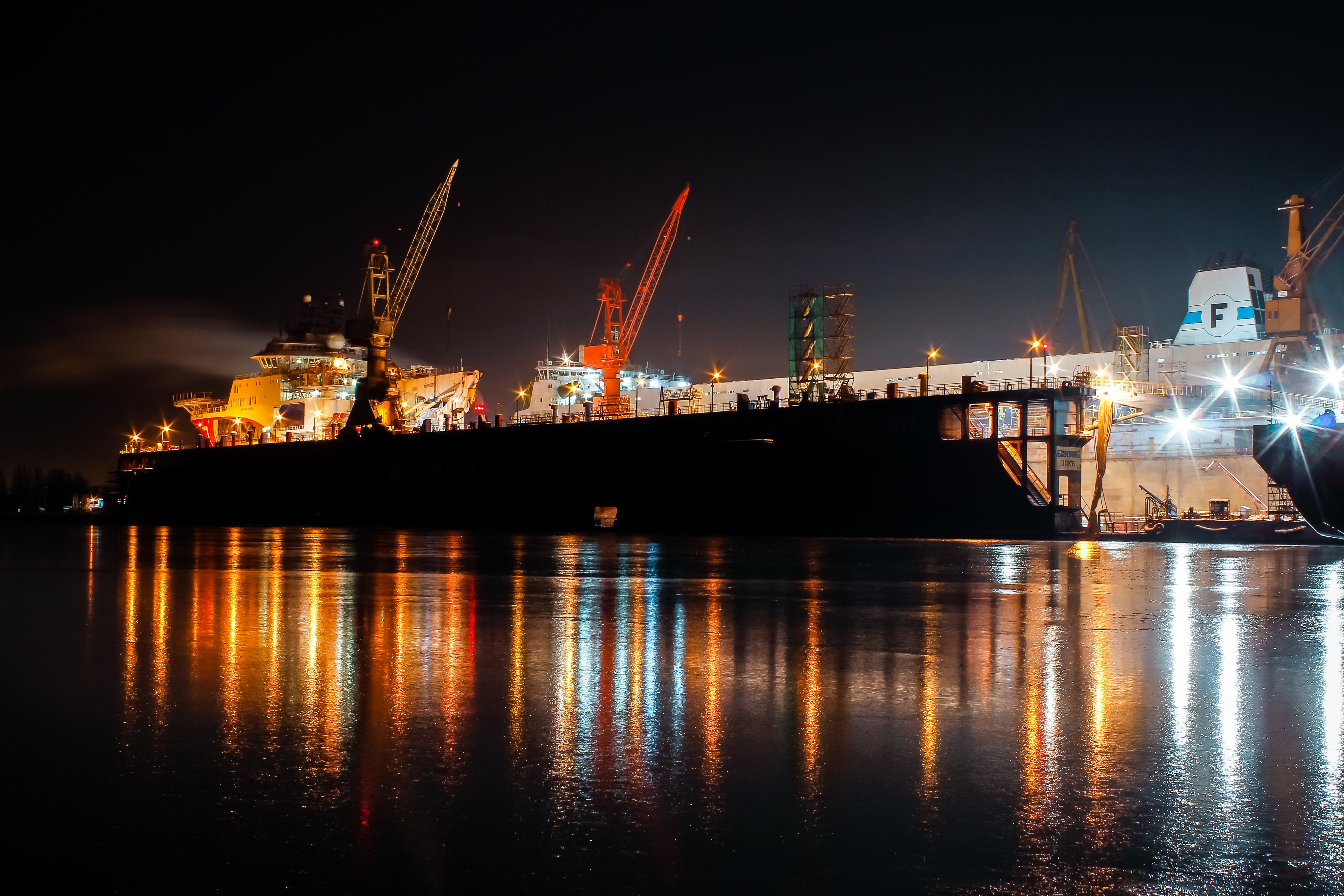 industrial-ship-dock-lit-at-night.jpg